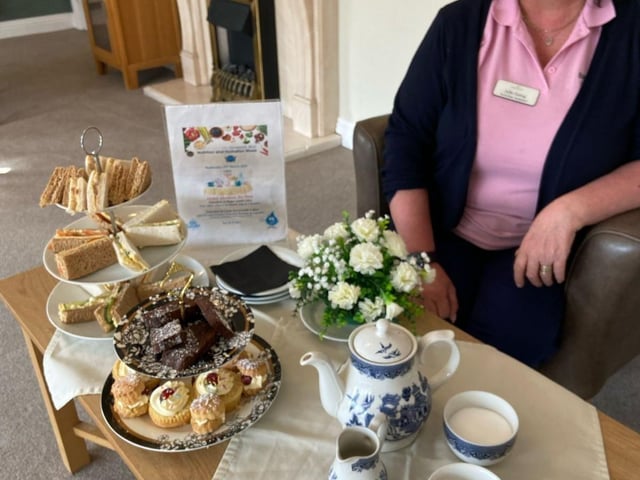 Julie, Activities Assistant serves up afternoon tea