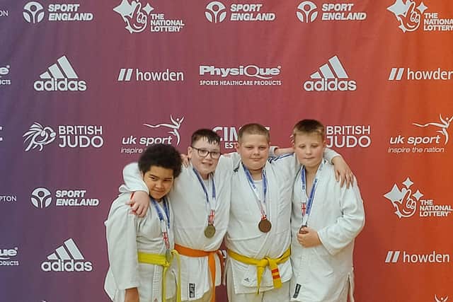 British Champion Stanley (2nd from left) on the podium