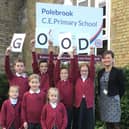 A range of Polebrook CE Primary pupils with Head teacher Lou Coulthard