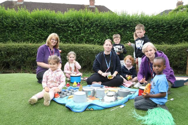 Children at Ronald Tree Nursery School in Kettering  with NMPAT staff