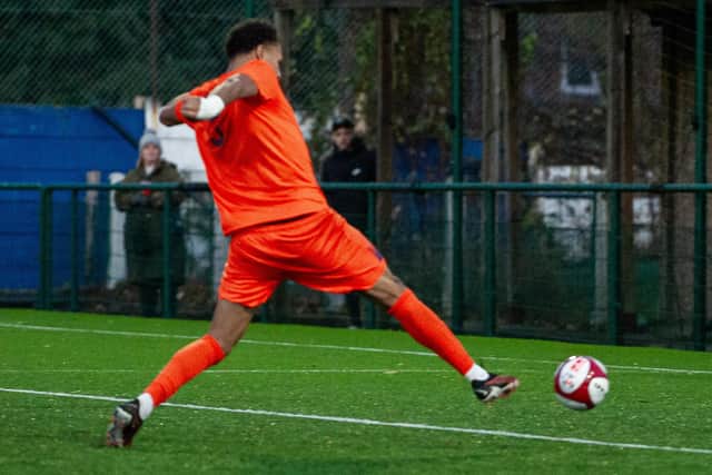 Rhys Kelly stabs home Corby Town's opening goal at Sutton Coldfield Town on Saturday (Picture: Jim Darrah)