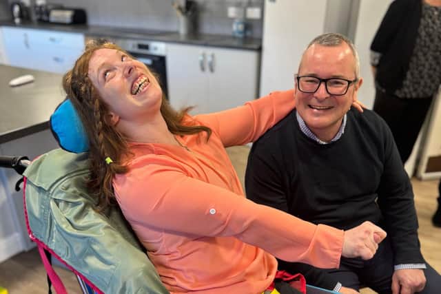 Lee Barron pictured with a person supported by Voyage Care