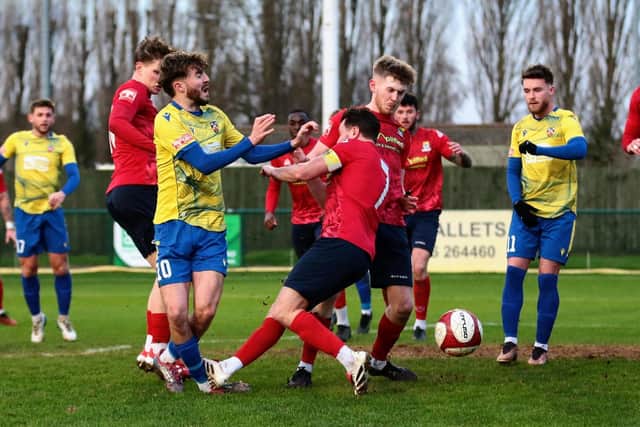 Wellingborough Town striker Will Jones was injured by this challenge in the New Yeae's Day clash with St Neots Town (Picture: Rob Webb)
