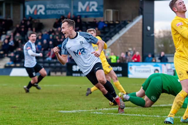 Toby Hillard is all smiles after scoring for Corby Town in Saturday's loss to Harborough Town (Picture: Jim Darrah)