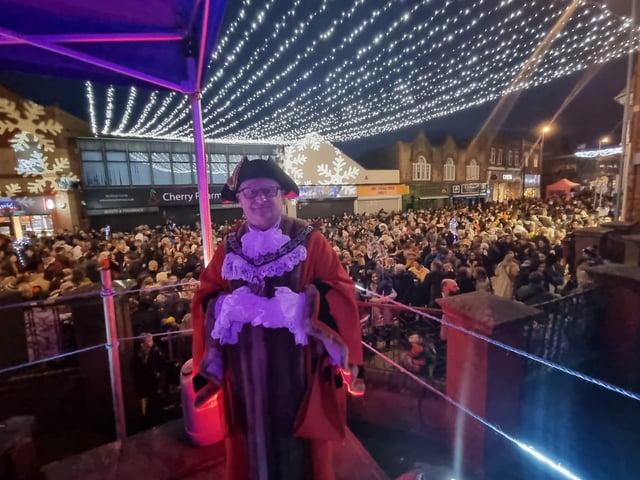 Rushden Mayor Cllr Adrian Winkle switched the lights on