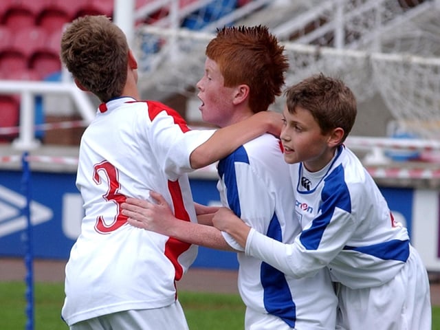 RETRO SPECIAL - Cup fever in Northamptonshire as we take a look back at football photos ahead of the FA Cup Final