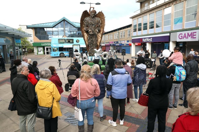 The community vigil was held in front of the Knife Angel in Corby town centre