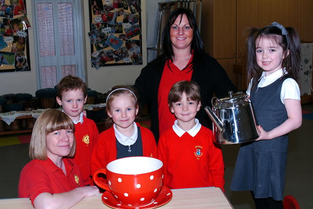 Wingate Infant School pupils (left to right) Euan Pakes, Isabella Corr, Finlay Holcroft and Sophie Walker along with teaching assistants Julie Byatt (left) and Sonia Cook took part in their coffee morning in 2013. Does this bring back happy memories?