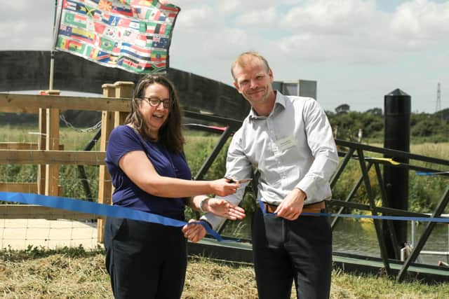 Claire Thirlwall from the NLHF and Norman Robinson from EA cut the ribbon