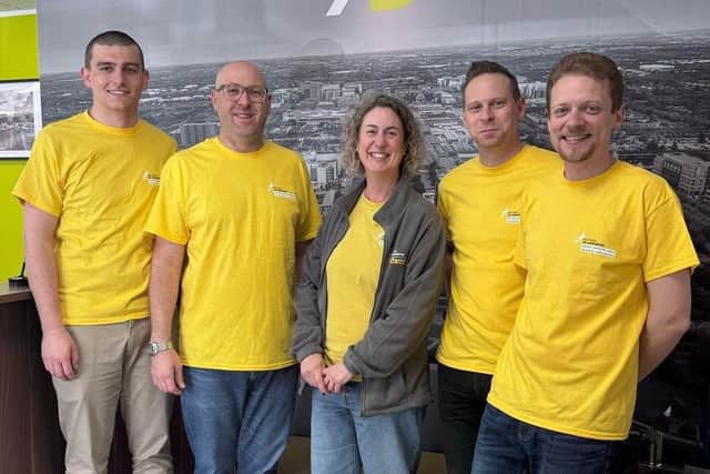 The Kirkby Diamond team from the Franklins £50 Challenge pose with Karen Hughes from The Air Ambulance Service. From left to right: Jacob Holmes, Paul Quy, Karen Hughes, Paul Hazell, Steve Cable.