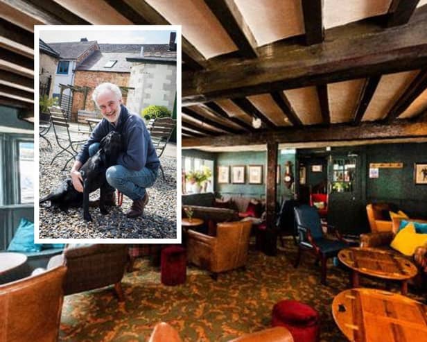 Ryck Turner has taken on a £5 million project to transform Oakham’s landmark Whipper-In Hotel. He is pictured in the hotel courtyard with his dog, Delilah. Image: Liberty PR