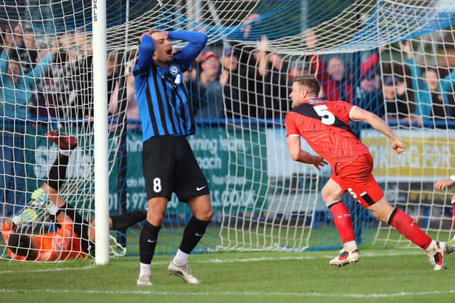 Kelvin Langmead runs away to celebrate after scoring Kettering Town's last-gasp leveller at Long Eaton on Saturday (Picture: Peter Short)