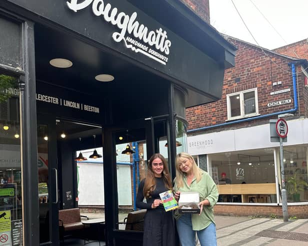 Megan from Nexus Fostering and Heidi from Doughnotts outside the Beeston branch.