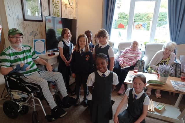 Pupils from Our Lady’s Walsingham School with Residents at Glenmoor House Care Home.