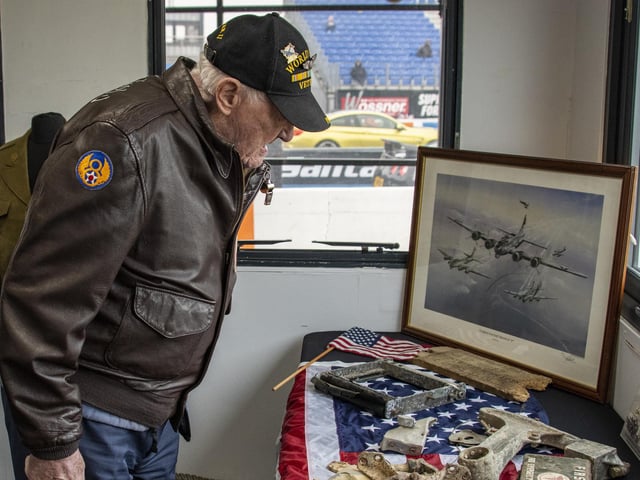 Mr Schrenk viewing memorabilia at Santa Pod