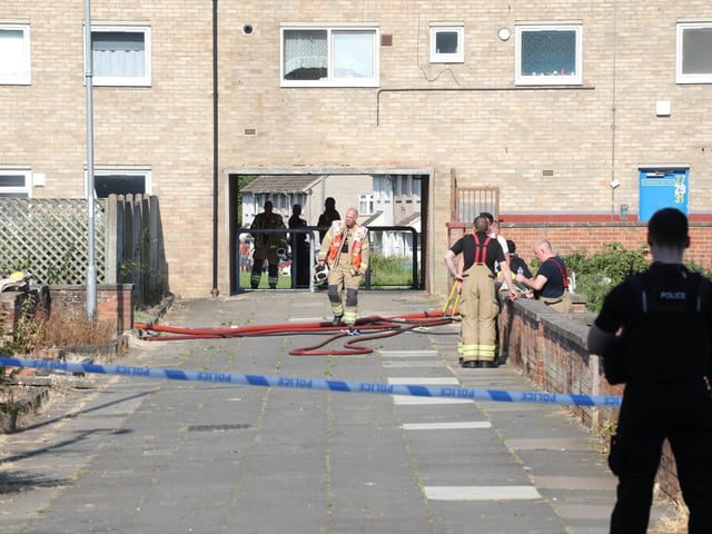 Emergency services on site at the house fire in Harrogate Court, Corby/National World