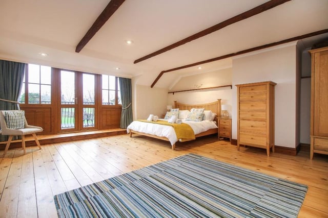 The master suite is very private and boasts a beautiful balcony to enjoy the open countryside. The first floor benefits a total of five bedrooms and six bathrooms.