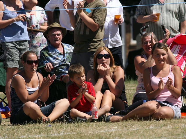 Crowds enjoy the pipe bands at Corby's Highland Gathering