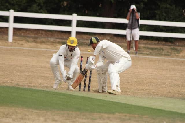Finedon's Drew Brierley is bowled in his side's loss to Peterborough (Picture: Finbarr Carroll)