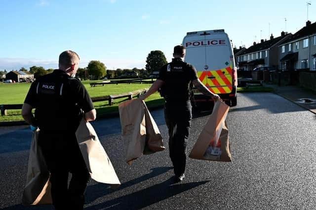 Police recovered details of bank accounts in dozens of names during the raids, carried out by 70 officers