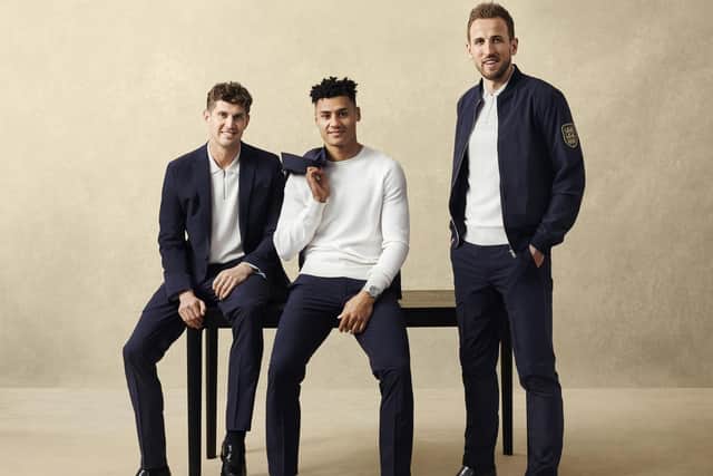John Stones wears: The Performance Suit Jacket, The Performance Zip Polo, The Performance Trouser & The LoaferOllie Watkins wears: The Performance Crew, The Performance Trouser & The LoaferHarry Kane wears: The Performance Bomber, The Performance Zip Polo, The Performance Trouser & The Loafer