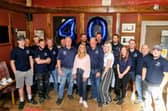 Staff celebrate 40 years of BM Pallets Ltd with founder Brian Martin/IMG