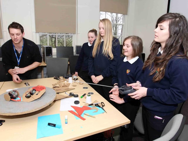 Pupils from Montsaye Community College taking part in a Roaming Robots workshop at the University of Northampton, March 2011