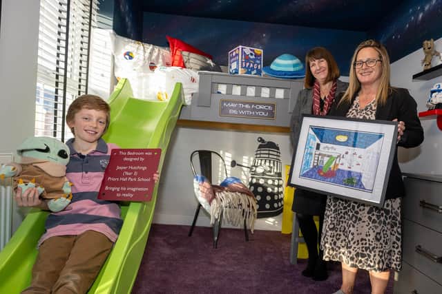 Davidsons Homes Area Sales Manager Victoria Barnaby and the Prior Halls Park Sales Manager with Jasper