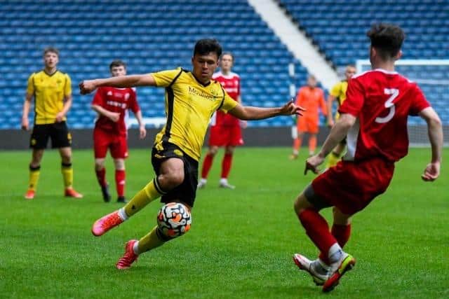 AFC Rushden & Diamonds Scholar Luis Pinto-Leite has signed first-team forms at Hayden Road