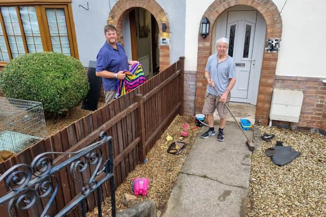 Nick Lattanzi and Richard Lund clearing up in Silverwood Road