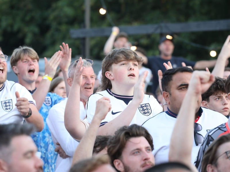 Fans at the Kettering Town FC World Cup Fan Zone watch England vs Argentina in the semi-final