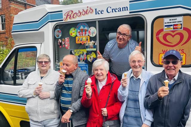 Age UK Northamptonshire clients enjoying an ice cream at the day centre in Rockingham Road, Kettering,