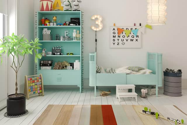 A colourful rug provides an inviting and comfortable area where children can play (photo: Adobe)