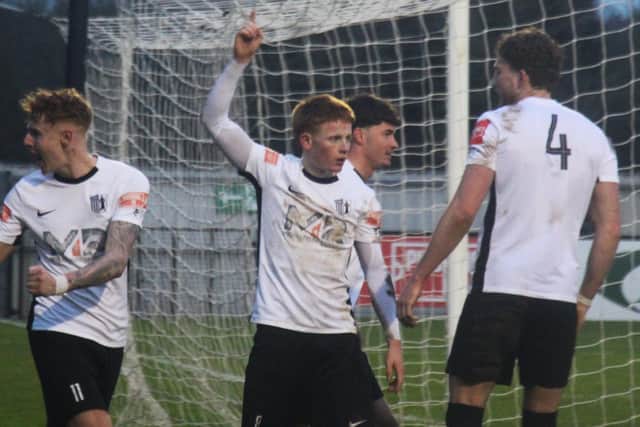 Harrison Jones celebrates after netting his penalty for Corby Town (Picture: David Tilley)