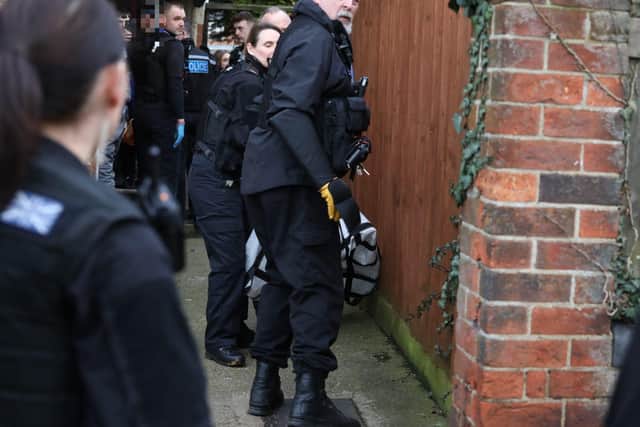 A sedated 'XL Bully' is removed from a flat in Kettering/National World