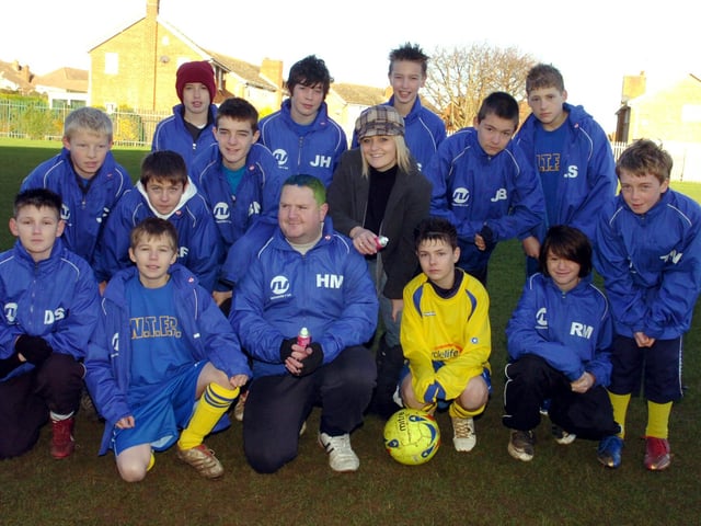 Wellingborough Town under 13 football team manager Haydn Morgan after having his hair coloured. He promised the team he would have it done in the team colours if the team won 9 successive games, 2007