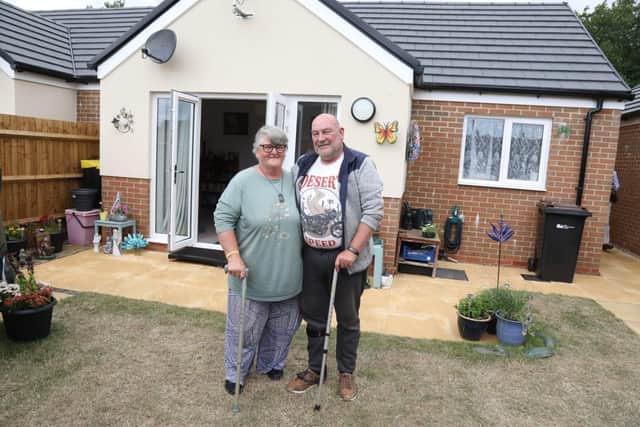 Kate and Rob Allen outside their new Kettering bungalow/National World