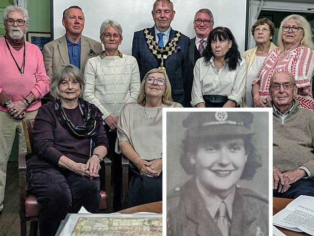 The newly-qualified tour guides join the very first batch of guides, Gwen Tobin (seated left) and Barry Matson (seated right), guests and organiser, Carol Fitzgerald (seated centre) at the certificate presentation (Credit: Robert Barnatt) and Betty Gilbert (inset)