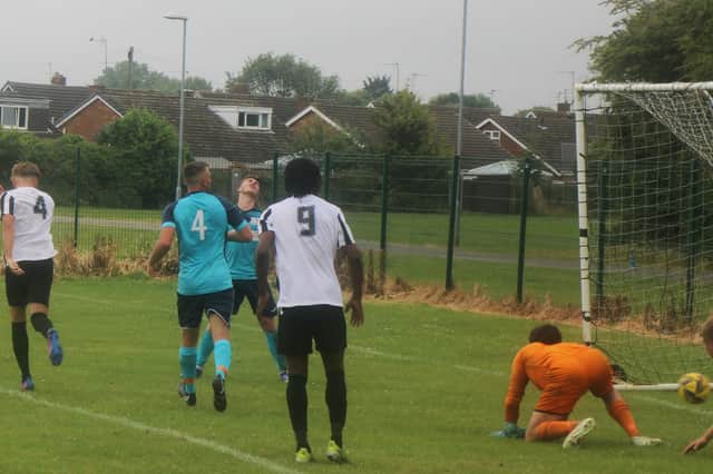 Matty Slinn scores Corby Town's first goal in their 2-1 friendly success over Birstall United. Picture by David Tilley