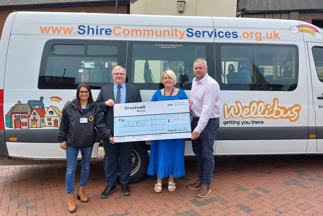 Representatives of Greatwell Homes and the Salvation Army wet with Shire Community Services managing director Jonathan Ekins to present a cheque to the organisation