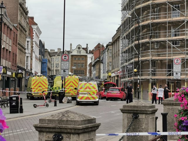 The scene in Northampton town centre today (Tuesday) as police and bomb squad units deal with "suspicious object" found in doorway near Market Square