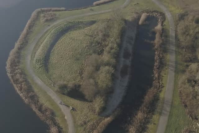 The barrow at Stanwick Lakes from the air