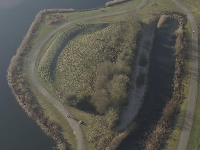 The barrow at Stanwick Lakes from the air