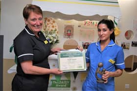 Skylark Staff Nurse Alpa Jadav receiving her award from Director of Nursing Jayne Skippen.
