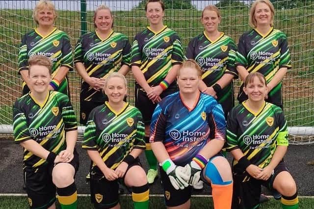 Some of the Northants Falcons squad line up in their new kit sponsored by Home Instead Rugby