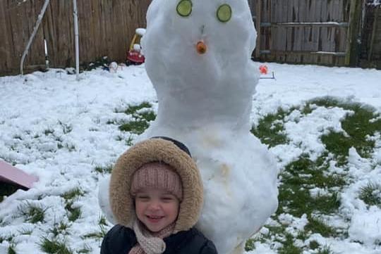 Faith playing in the snow in Kettering - picture by Sophie Rose