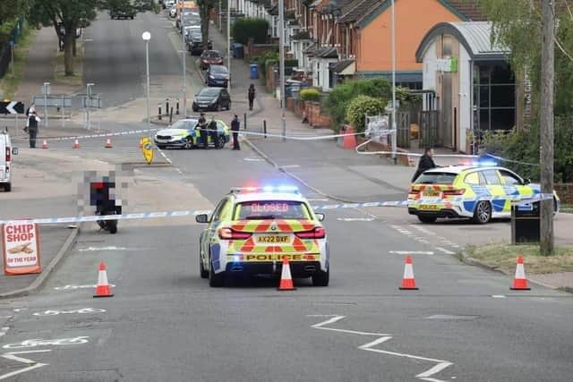 Police at the scene last year