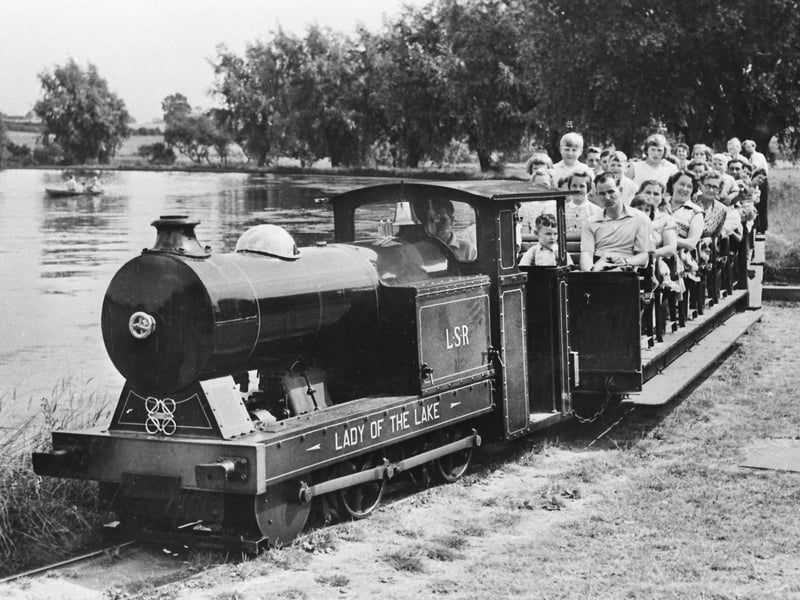 Lady of the Lake train passes the lake in the 1950s Wicksteed Park/National World