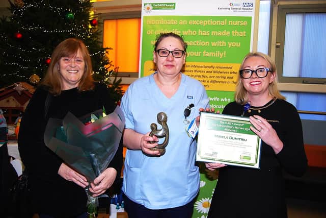 Medical Assessment Unit nurse Mirela Dimitriu with Angela Edward who nominated her and Group Chief Nurse Julie Hogg who presented the award.
