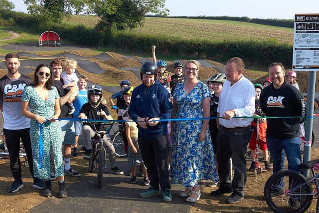 (Left to right) Paddy Sharrock (GB cycling team), Jade Close, James Sharpe (instigators of the project), Declan Brooks (Olympic Bronze medalist BMX), Cllr Helen Harrison, (North Northamptonshire Council), Simon Fairhall (Chair of KC Active Trustees), Oliver Underwood (C&K Construction)